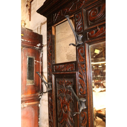 610 - Antique heavily carved oak hall stand