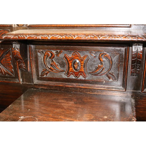 610 - Antique heavily carved oak hall stand