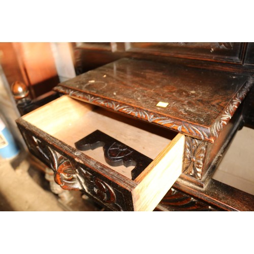 610 - Antique heavily carved oak hall stand