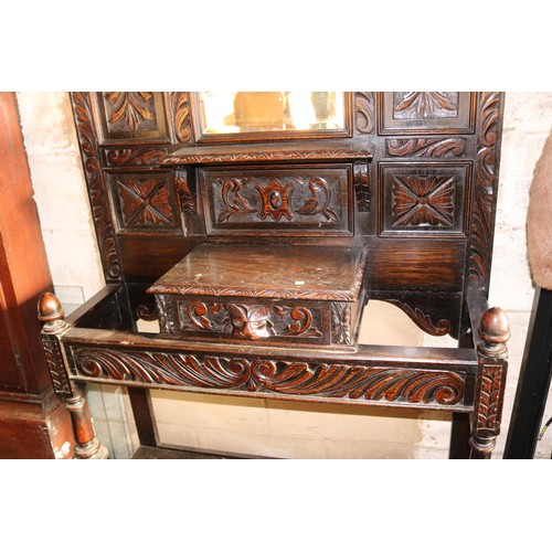 610 - Antique heavily carved oak hall stand