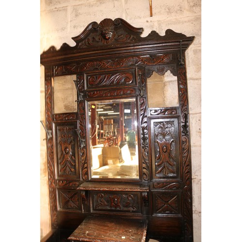610 - Antique heavily carved oak hall stand