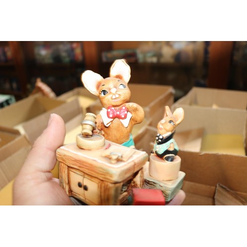 622 - 3 boxed Pendelfin ornaments; auctioneer, event piece no. 4, cracker