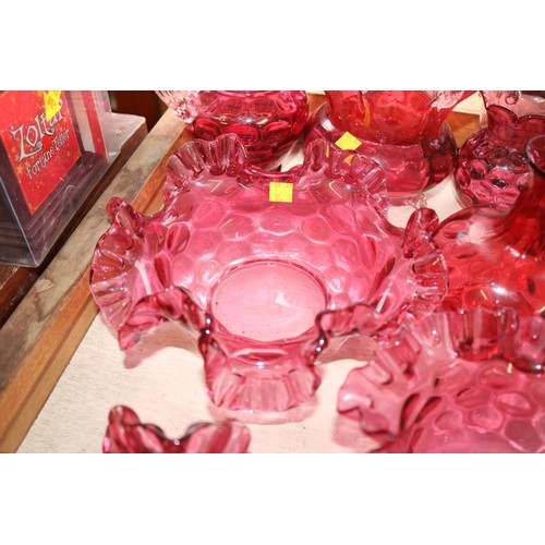 634 - 8 pieces of Cranberry glass