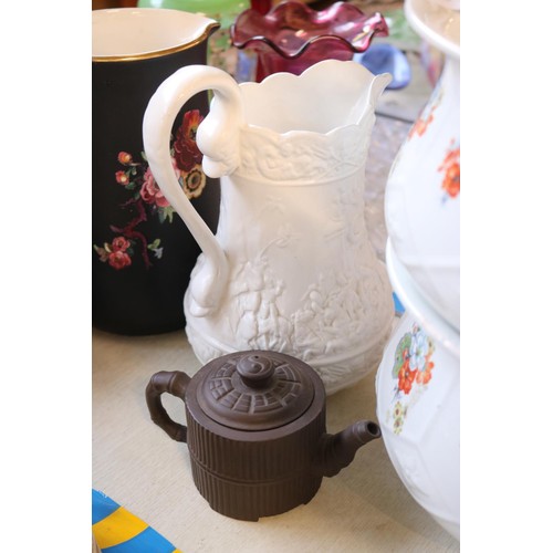 645 - Oriental china, jugs, chamber pots, etc