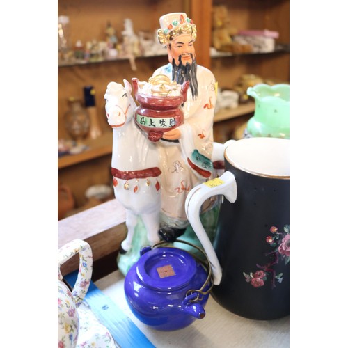 645 - Oriental china, jugs, chamber pots, etc