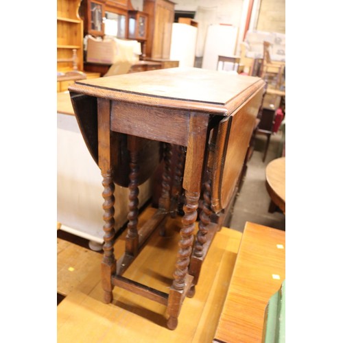 662 - Oak barley twist gate leg drop leaf table (marks to top)