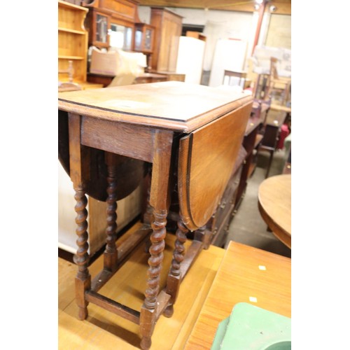 662 - Oak barley twist gate leg drop leaf table (marks to top)