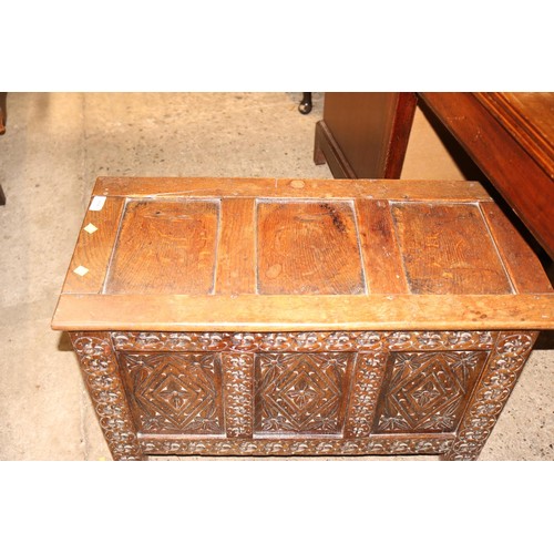 694 - Small oak carved 3 panel chest