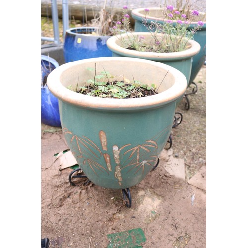 23 - 3 glazed pots with stands