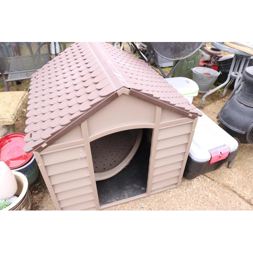 57 - Dog kennel with dog bed inside