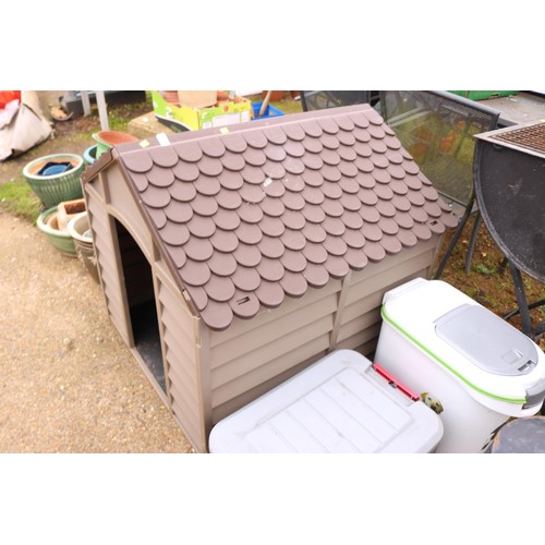 57 - Dog kennel with dog bed inside