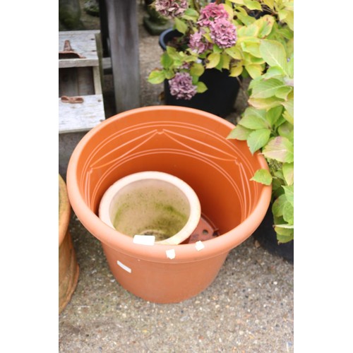 72 - Large plastic planter & pot clay