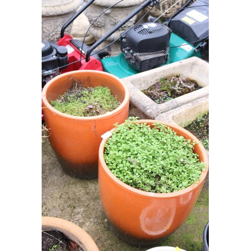 97 - Pair of orange/black glazed planters