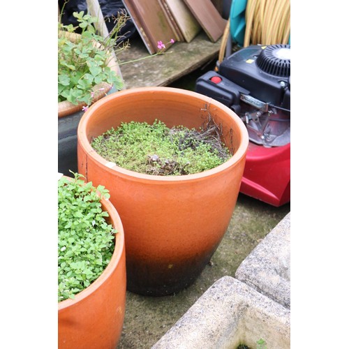 97 - Pair of orange/black glazed planters