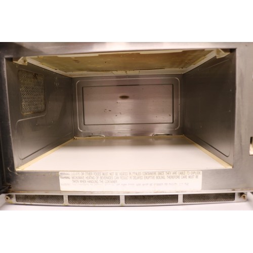 127 - Microwave - warranted until 12 noon Tuesday following the above sale