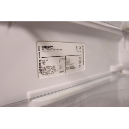 135 - Beko fridge freezer - warranted until 12 noon Tuesday following the above sale