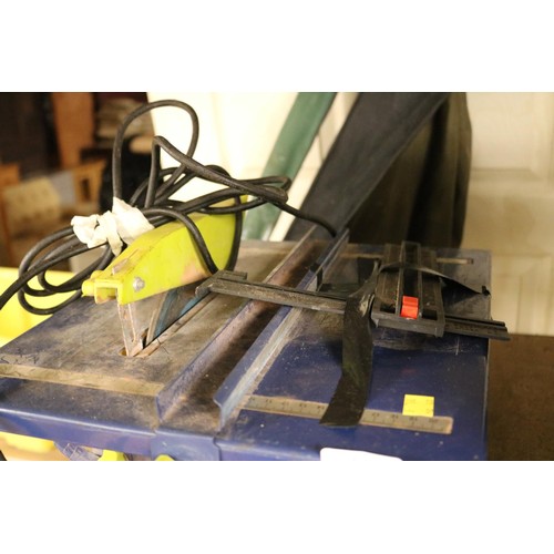 142 - Electric tile cutter - warranted until 12 noon Tuesday following the above sale