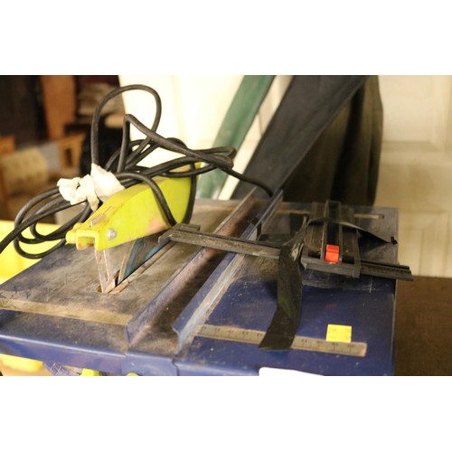 142 - Electric tile cutter - warranted until 12 noon Tuesday following the above sale