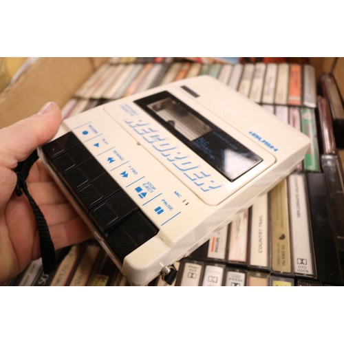 331 - Box of 100 country & western cassettes & tape recorder