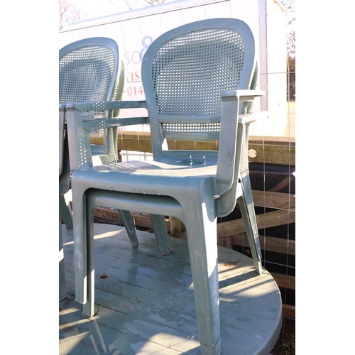 36 - Plastic garden, patio table and set a four chairs