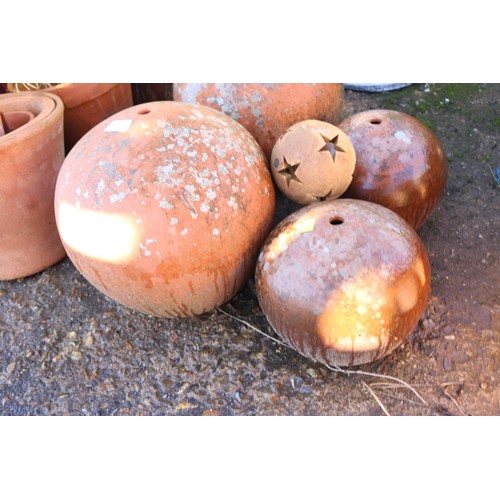 58 - Five times clay round ball garden ornaments