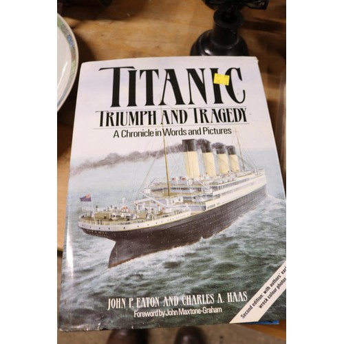 430 - Books o the Titanic under the sea and before the disaster, also books on military planes, etc