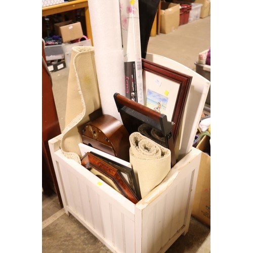 702 - Wooden bin with misc, incl rugs, pictures, rolls of fleeq & polystyrene, clock, etc