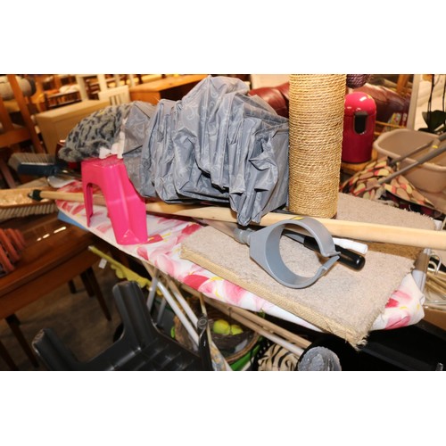 704 - Ironing board, clothes airer, various bins, brooms, cat accessories, iron, etc