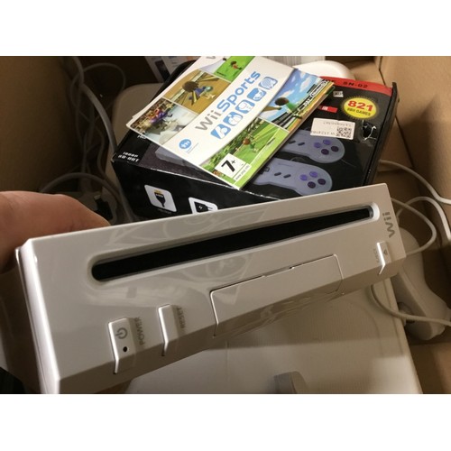 303A - Wii Game console including games super mini SN - 02, balance board remote controls etc-warranted unt... 