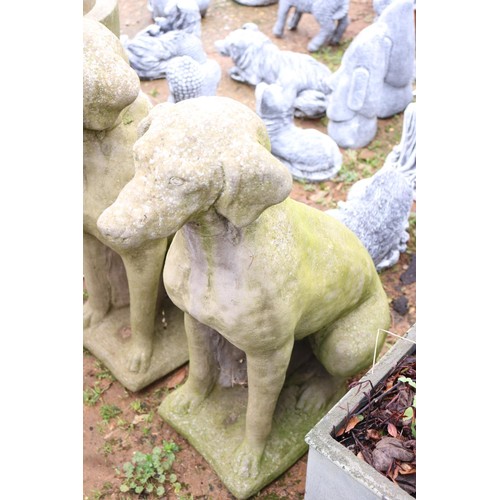 39 - Pair of large dog ornaments