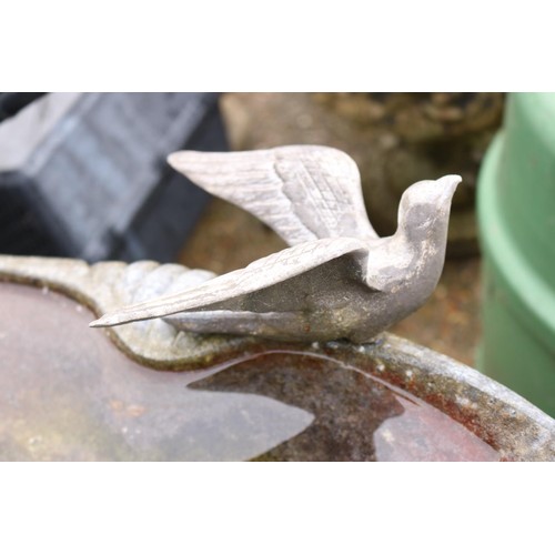 84 - Cast iron bird bath depicting fish stand & shell bath