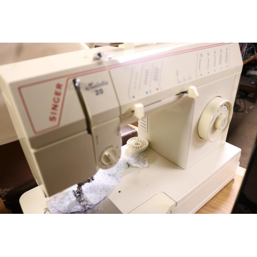 101 - Singer electric sewing machine & pedal - warranted until 12 noon Tuesday following the above sale