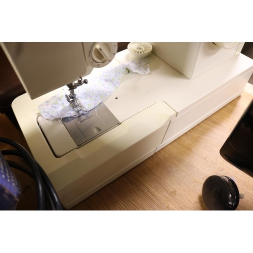 101 - Singer electric sewing machine & pedal - warranted until 12 noon Tuesday following the above sale