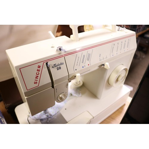 101 - Singer electric sewing machine & pedal - warranted until 12 noon Tuesday following the above sale