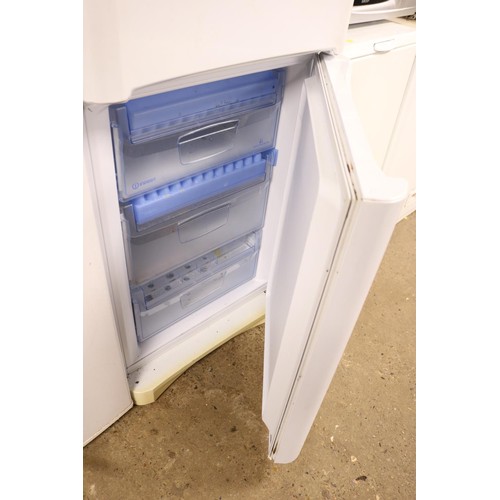 111 - Indesit fridge freezer - warranted until 12 noon Tuesday following the above sale