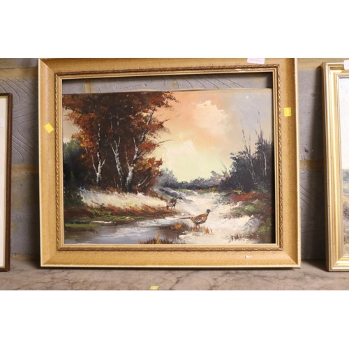 170 - Framed oil on canvas, pheasants in snow, signed Rango