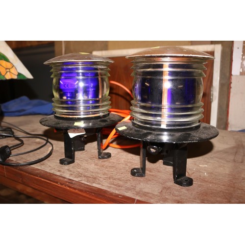 472 - Pair of heavy brass & metal nautical lamps (1 wired) - to be rewired by a qualified electrician