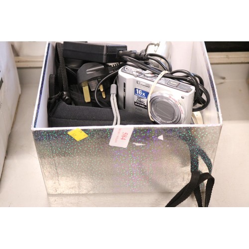 584 - Box containing various cameras