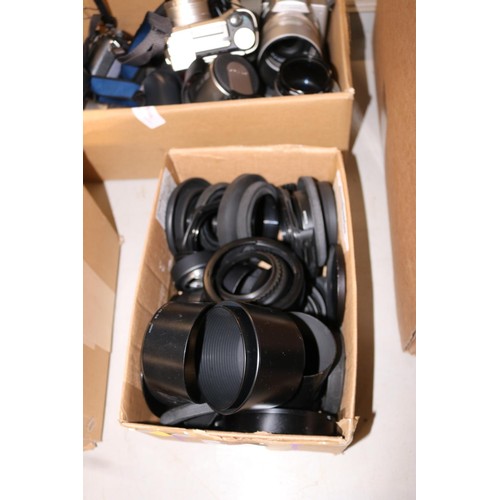 597 - Box of various camera lenses covers