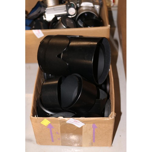 597 - Box of various camera lenses covers