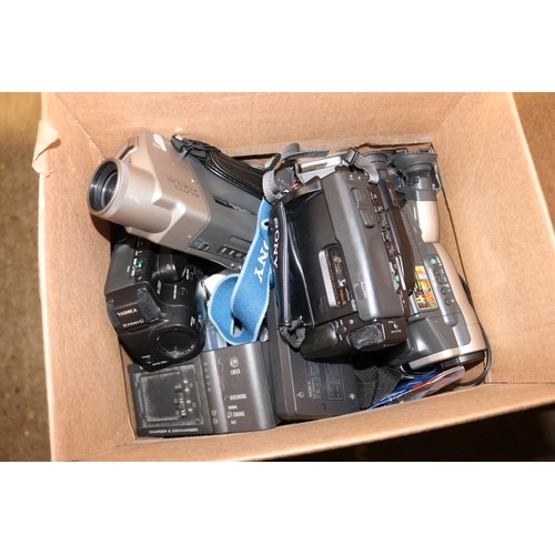 599 - Box containing various Sony handheld video cameras