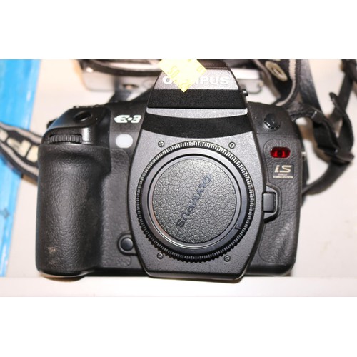 603 - 3 x Olympus  cameras?