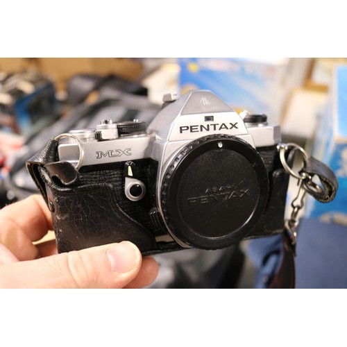 611 - Pentax camera, lens, and Case