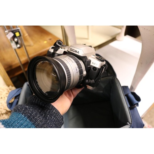 614 - Sigma camera and lens and bag