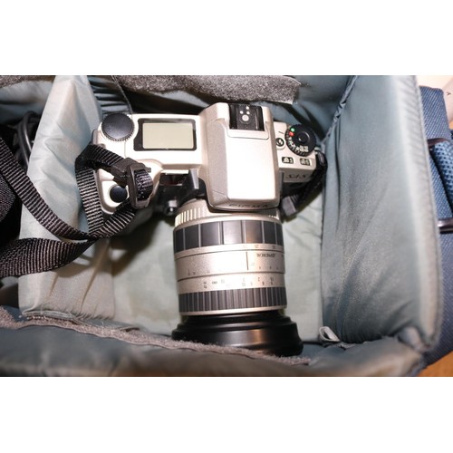 614 - Sigma camera and lens and bag