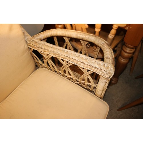 647 - Wicker conservatory wing back chair