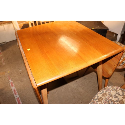 648 - Ercol drop leaf dining table with 4 chairs