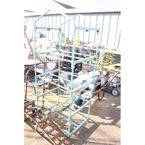 64 - Wheelbarrow, including tools and greenhouse frame etc