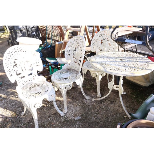 70 - Victorian reproduction, metal patio table and three chairs