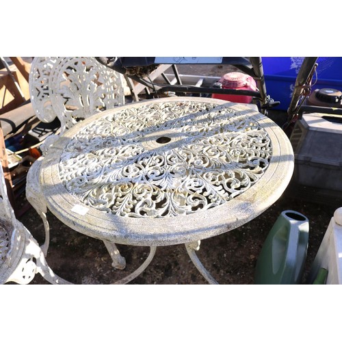 70 - Victorian reproduction, metal patio table and three chairs